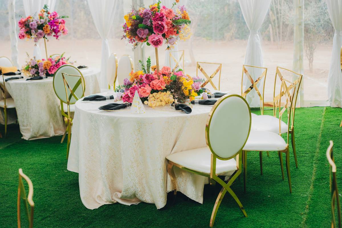 A minimalist wooden tray holding candles, dried eucalyptus, and a small vase—classic pep home centerpieces for everyday elegance.