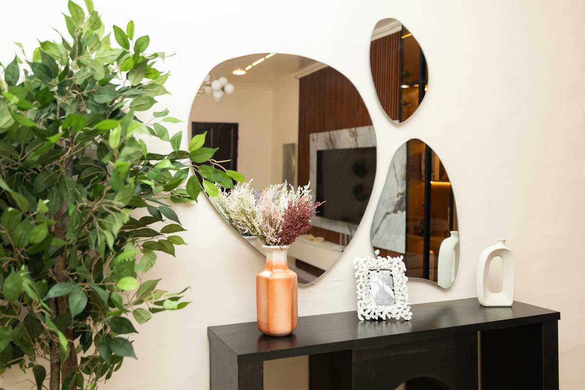 ramon at home centerpieces featuring a minimalist wooden tray with dried eucalyptus and ceramic vase